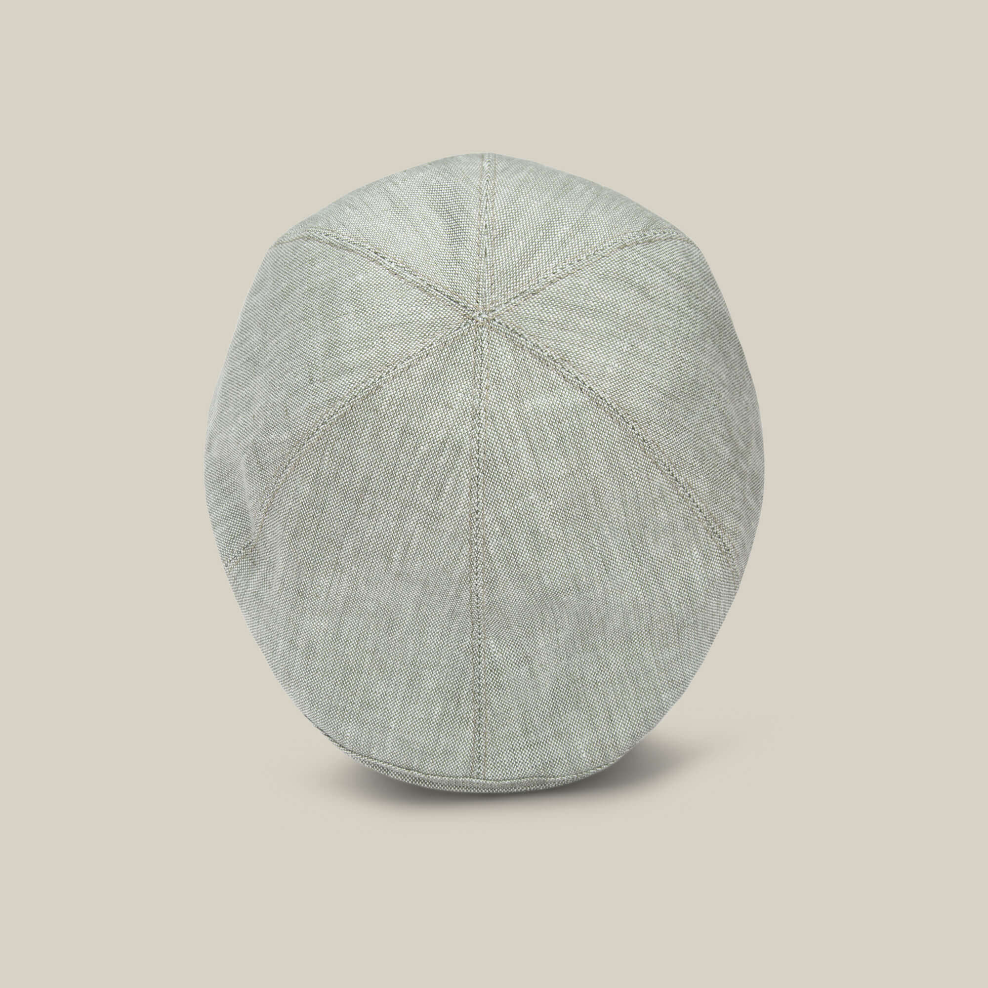 The Benjamin Paul by Goorin Bros. is a light grey linen hat with a textured finish. Shown from above on a beige background, it's an ideal three-season accessory for everyday wear.