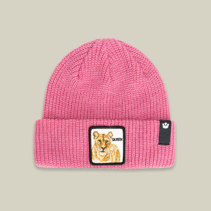 The Queen Beanie by Goorin Bros. is a pink knit hat with a bold tiger patch—perfect for adding standout style to chilly winter days.
