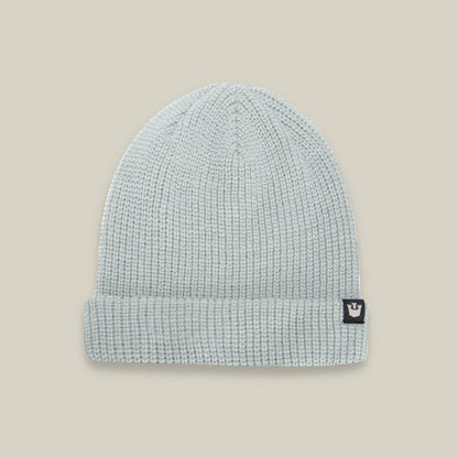 The Goorin Bros. Air to Fakie beanie in light grey is a lightweight poly knit accessory with a folded brim and a black patch featuring a white crown logo—perfect for all seasons.