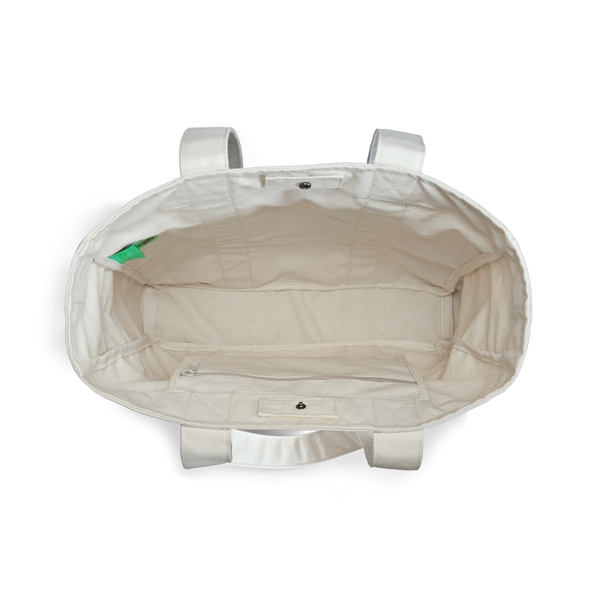 Top view of the Goorin Reworked Tote by Goorin Bros., made in the USA with two handles, a small inner pocket, and a green side label.
