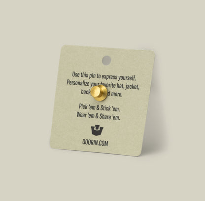 The Goat Trucker Pin by Goorin Bros., crafted in gold zinc alloy, comes on a square Goorin card—perfect for customizing your hats and jackets.