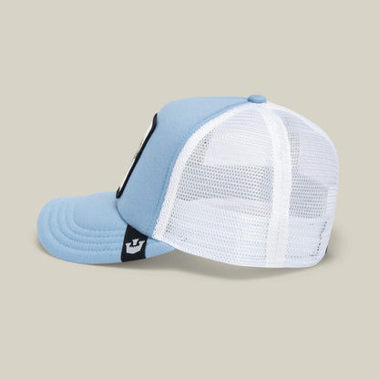 The Goorin Bros. "So Big" kids cap features light blue and white panels, sky blue mesh, and a black embroidered elephant patch on the side, shown from a side angle against a plain beige background.