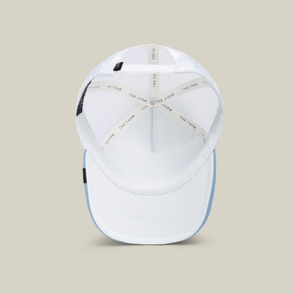 A top view of the Goorin Bros. So Big kids cap with a white crown, light blue brim, inside stitching, THE FARM branded tape, and sky blue mesh for breathability.