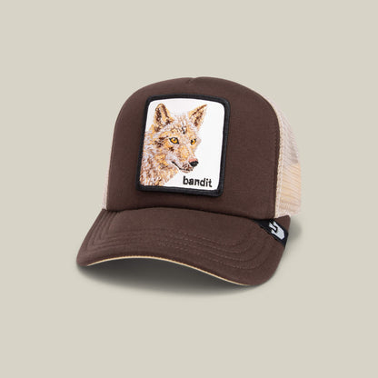 The Chaser by Goorin Bros. is a brown and beige kids cap with a front "bandit" coyote patch and a breathable mesh back for comfort.