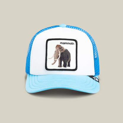 The Goorin Bros. Mammoth Kiddo is a blue and white trucker hat for kids, featuring an embroidered woolly mammoth patch with "mammoth" above it—the perfect adventure hat for young explorers.