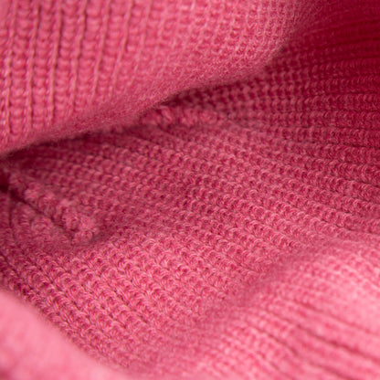 Close-up of the soft pink knit texture and stitching details on Goorin Bros.'s The Cuddly Beanie Mini, perfect for kids and featuring a cute teddy patch.