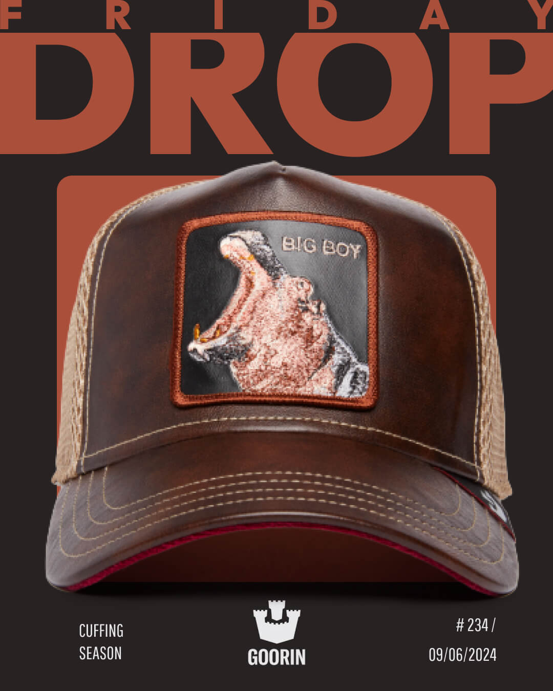 Brown mesh trucker hat with a patch featuring an open-mouthed hippo and the text BIG BOY. Show off your style with this bold hat design. Text on the image reads Friday Drop, Cuffing Season, GOORIN, #234, and 09/06/2024.