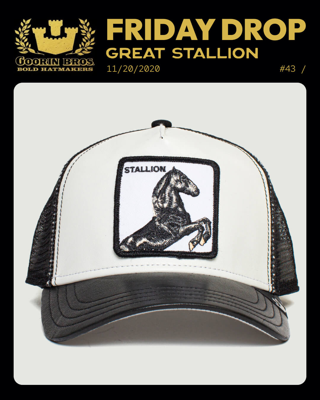 A white and black American made trucker hat featuring a patch with an image of a rearing stallion and the word STALLION on the front.