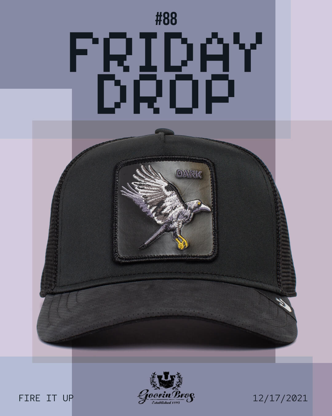 A black mesh Goorin trucker hat with a patch of a flying black bird holding a gold key; text reads #88 Friday Drop. The date 12/17/2021 and Fire It Up appear at the bottom.