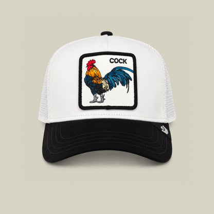 The Goorin Bros. Suede Colorful Rooster is a black and white trucker hat with a mesh back and snapback closure, featuring a colorful embroidered rooster patch on the front panel.