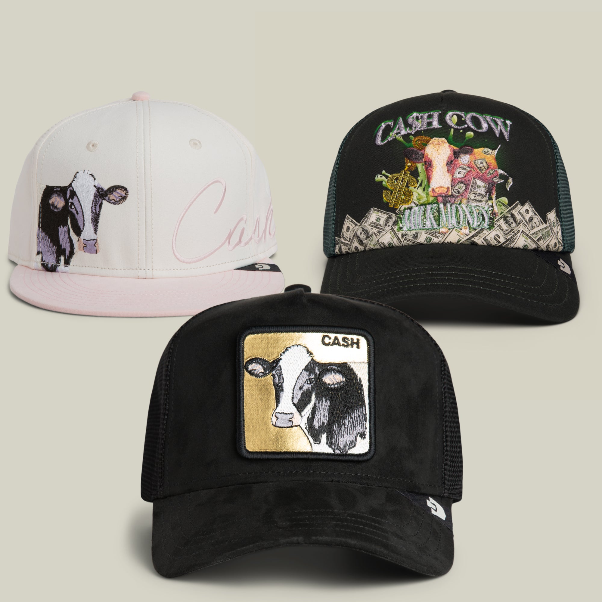 Introducing the Grand Teatons Bundle by Goorin Bros.—a set of three baseball caps, each featuring a signature cow design and showcasing Goorin’s renowned craftsmanship. The bundle includes a black cap, a white-and-pink cap, and a black cap with green accents plus a money-inspired graphic. Each hat combines playful style with everyday versatility for peak performance wherever you go.