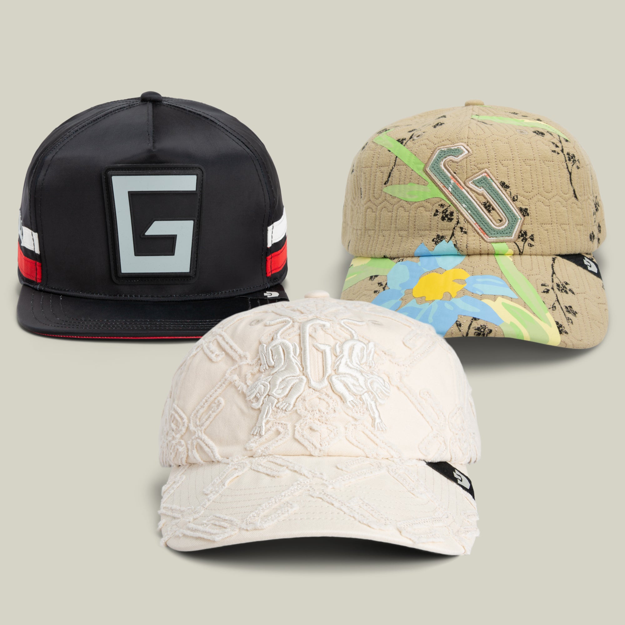 The Nuthin But A G Thang Bundle by Goorin Bros. showcases three baseball caps in black, beige, and cream hues, each adorned with distinctive textured or graphic designs on the front panels that capture the iconic Goorin Bros. signature logo hat style.