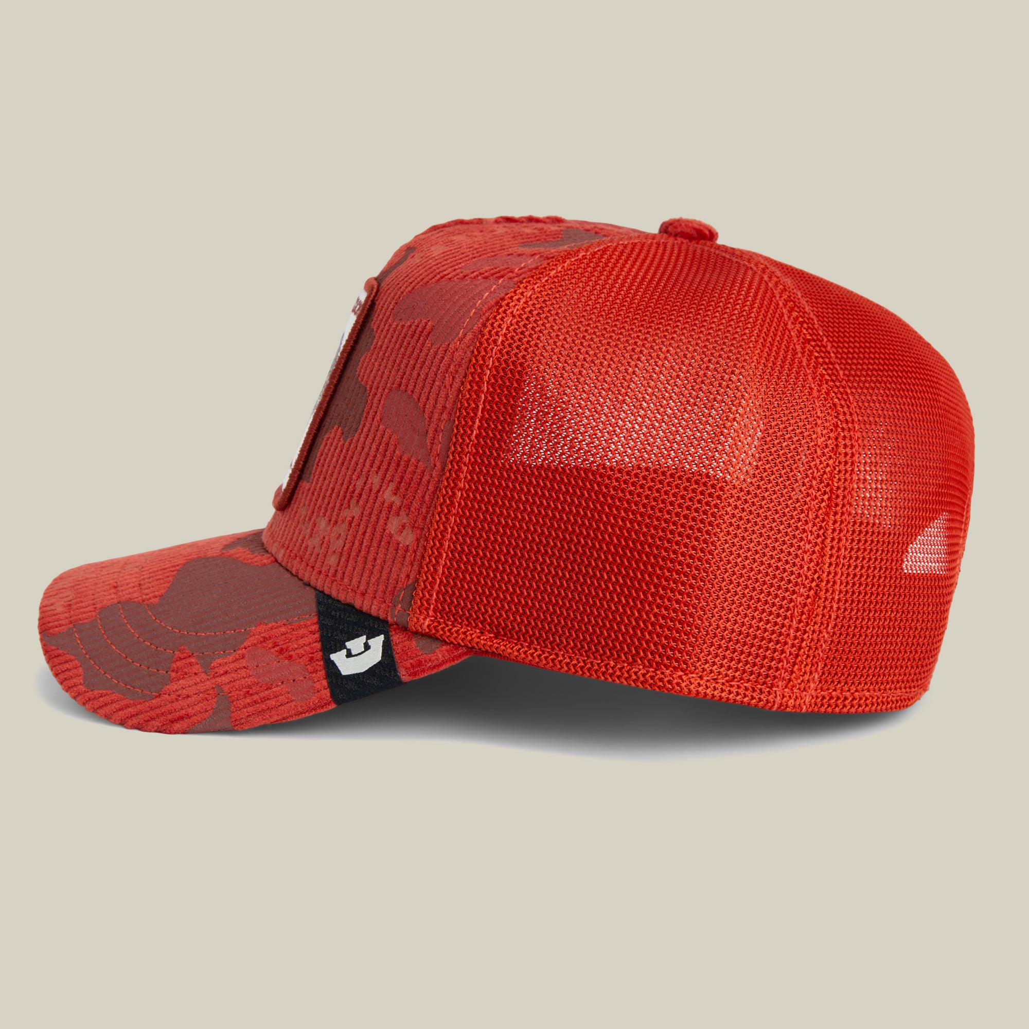 Goorin Bros. Rooster Camo mesh baseball cap featuring a curved brim and camouflage front panel, viewed from the side against a plain background.