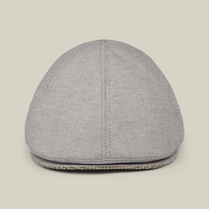 The Mile Rock, a light gray 6 Panel Ivy flat cap by Goorin Bros., is displayed from the front against a plain off-white background, showcasing its hand-cut and sewn craftsmanship.